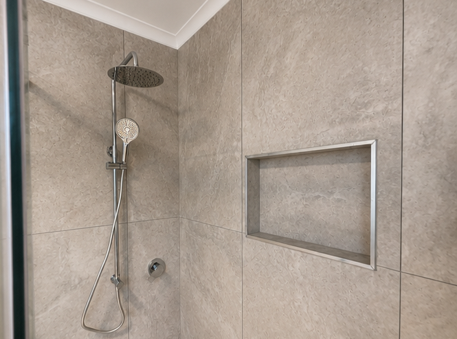 Bathroom maintenance project featuring restored double vanity, gold fixtures, and refreshed cabinetry