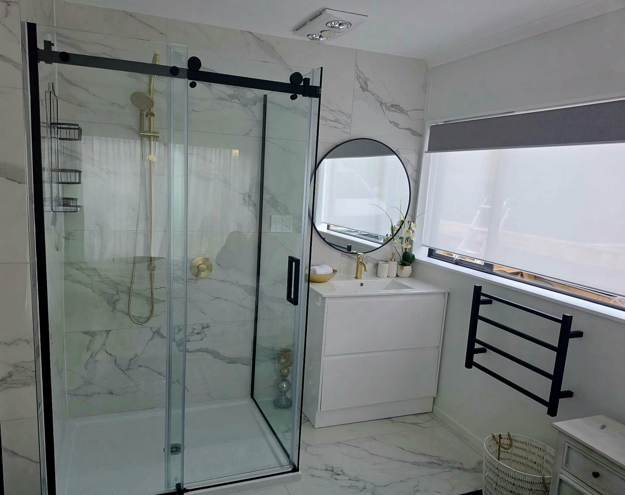 Complete bathroom remodel in Auckland home with heated floors, custom cabinetry, and premium finishes