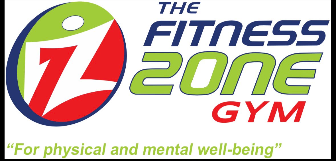 Athletes training hard with free weights in a premium, modern gym environment at The Fitness Zone