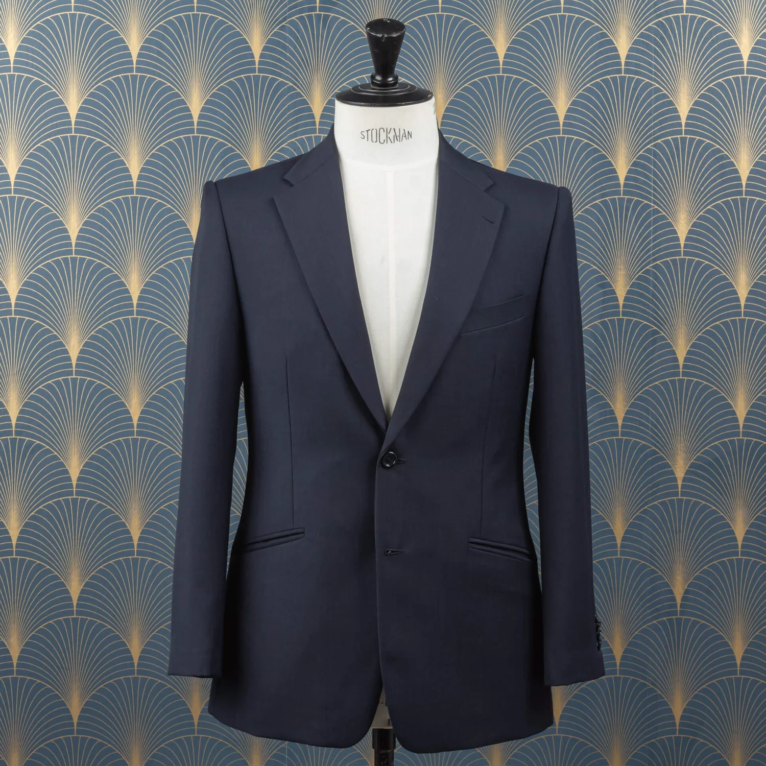 Freshly pressed luxury navy blue bespoke suit
