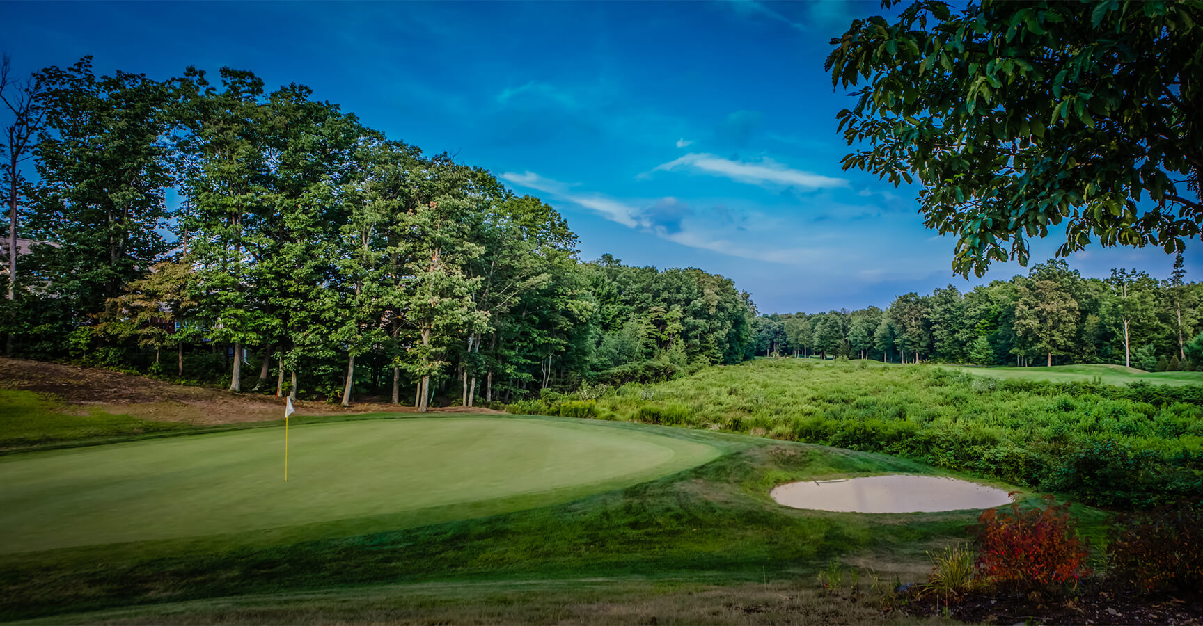 Sand Springs golf course fairway with rolling green hills in Drums Pennsylvania