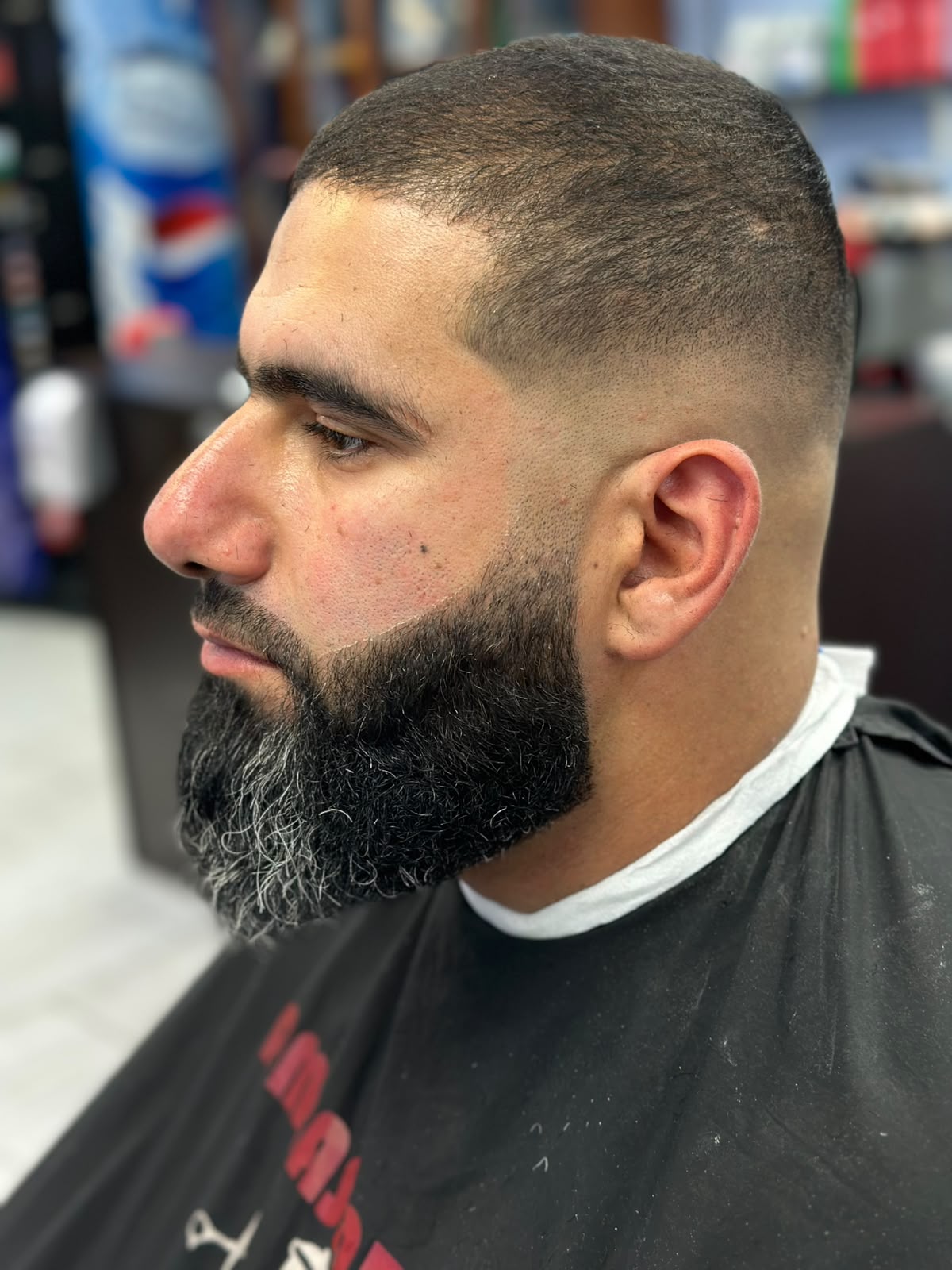 Precision mustache grooming and trimming with scissors at Ambassador Barber Shop Calgary