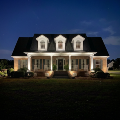 Luxury home exterior lighting showcasing complete custom design installation