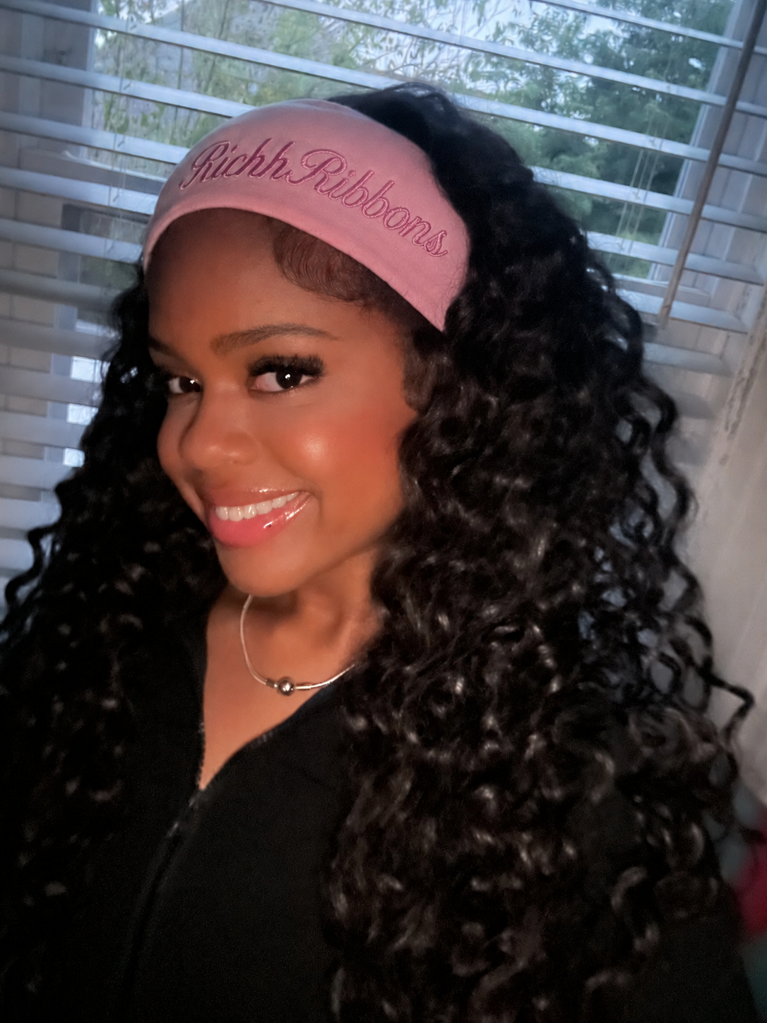 Black girl wearing a plain baby blue headband with no bow, dreamy pastel aesthetic