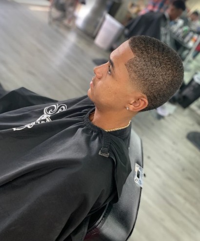 Clean modern taper fade haircut demonstrating blending skills