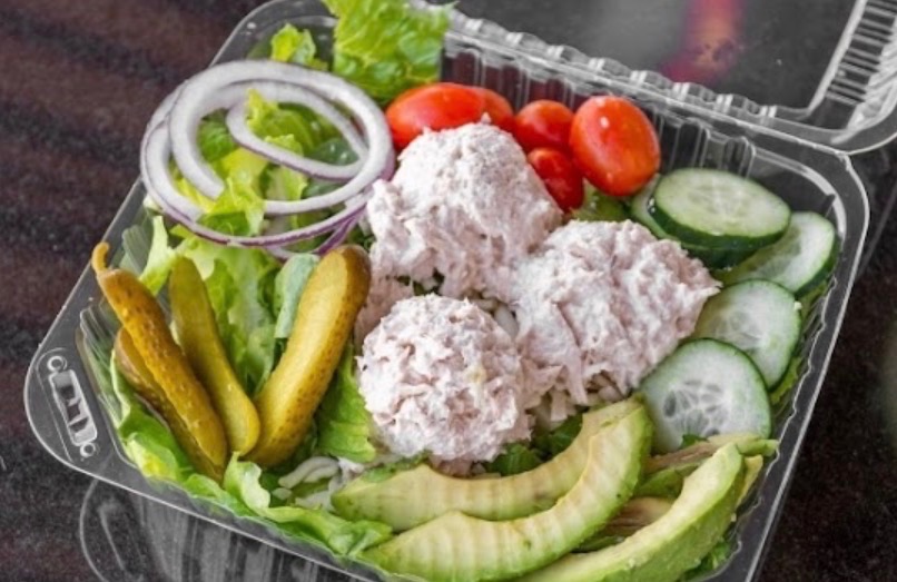 Fresh garden salad with crisp mixed greens, seasonal vegetables, and house-made dressing