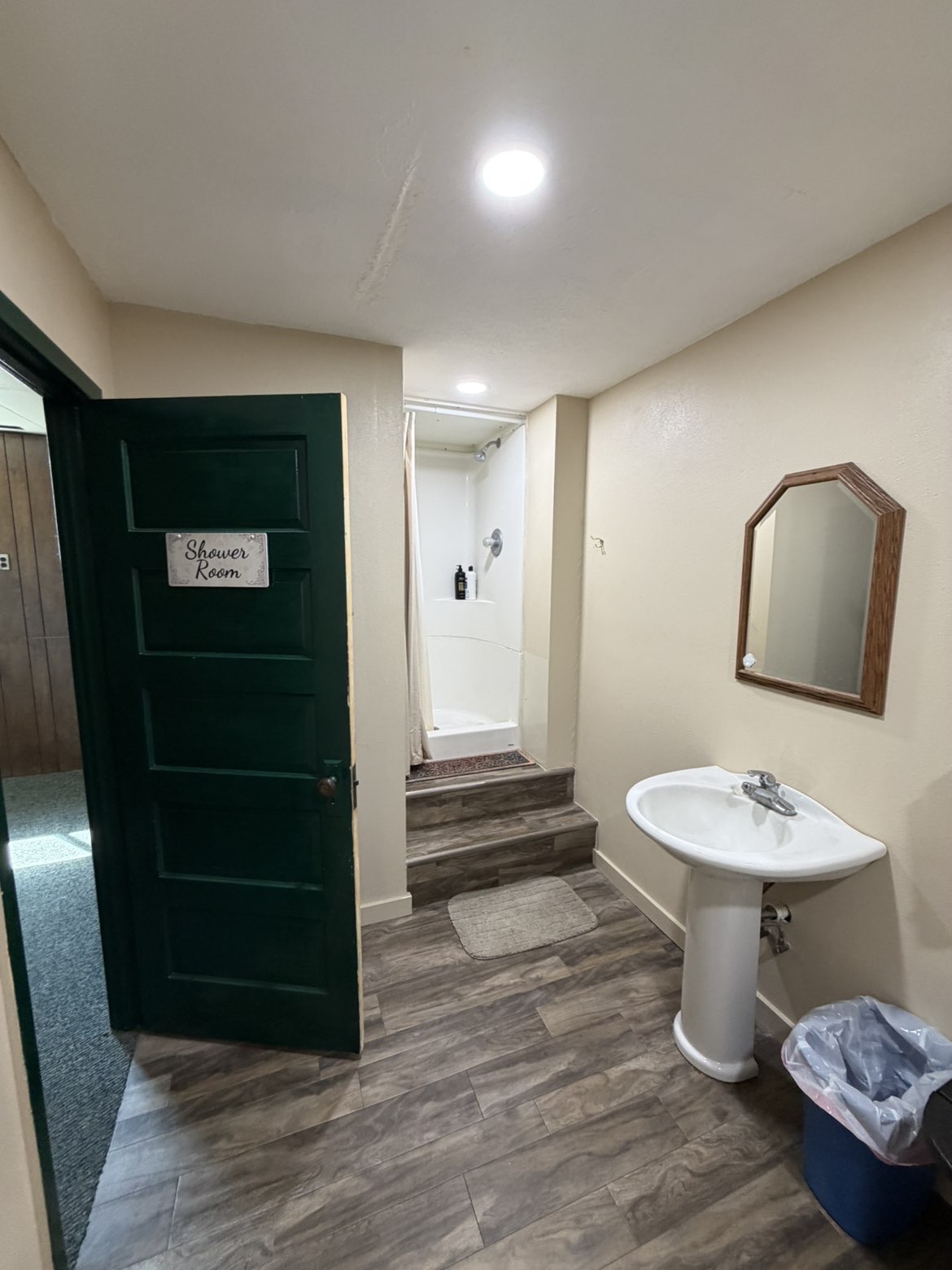 Clean private bathroom with a shower