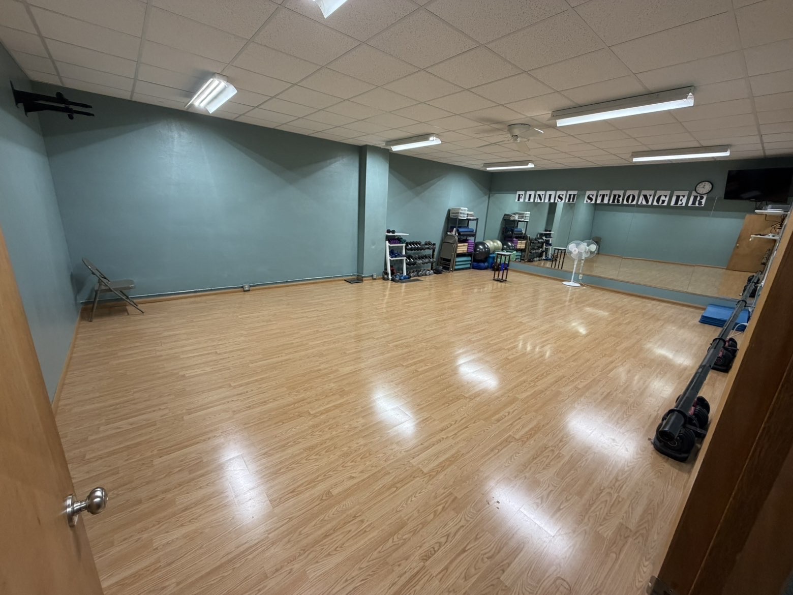 Multipurpose room with open floor space for stretching, functional training, and group classes