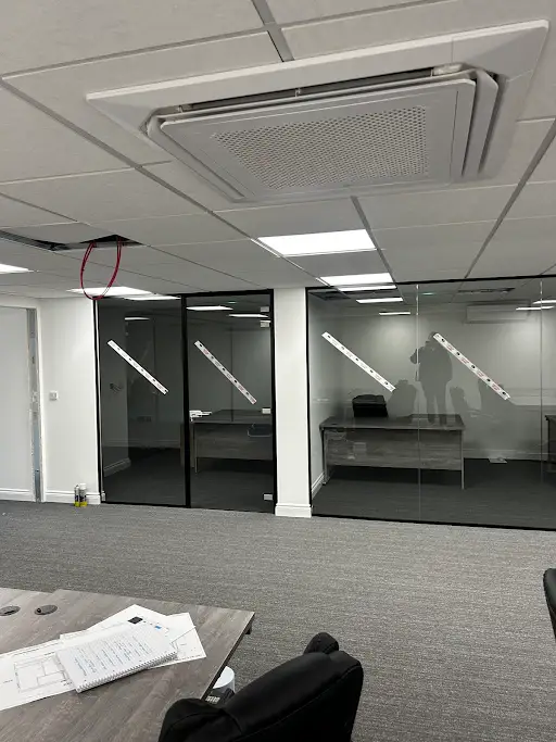 Modern commercial office space fit out with exposed steel and clean finishes
