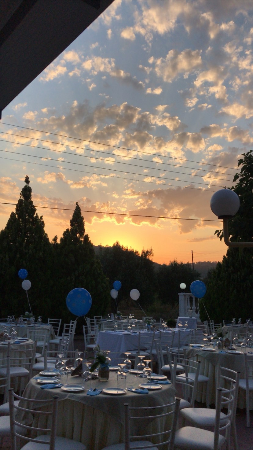 Elegant outdoor dining at Exochiko with natural views