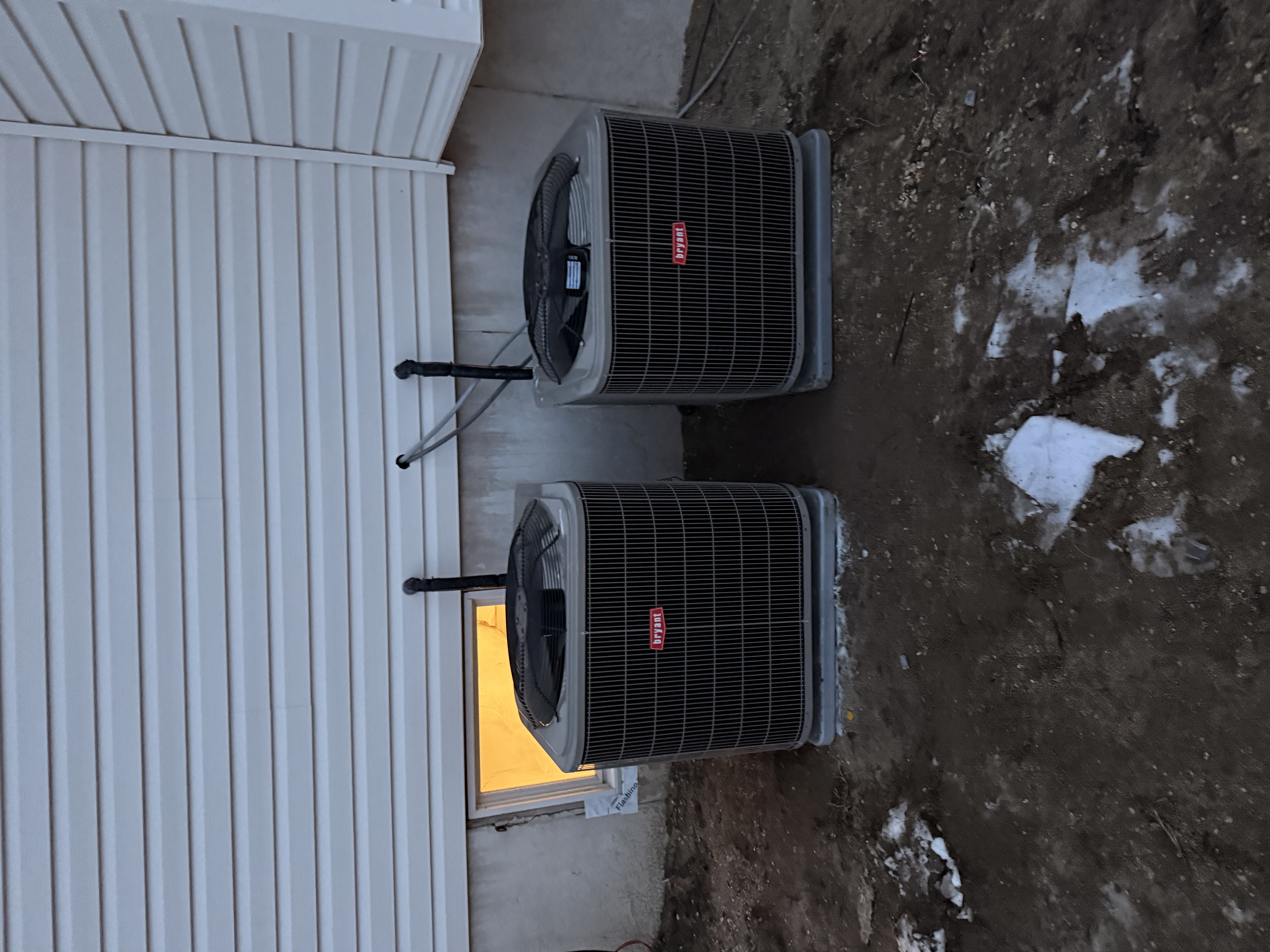Complete central air conditioning system installation with new thermostat