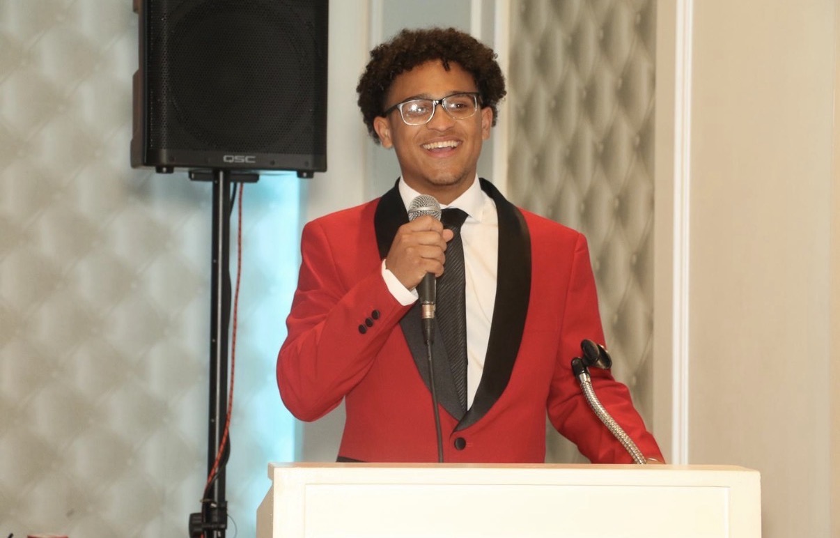 Anthony Ross, CEO and Founder of Personal Home Listing, professional headshot of a web design expert and real estate marketing executive in business attire