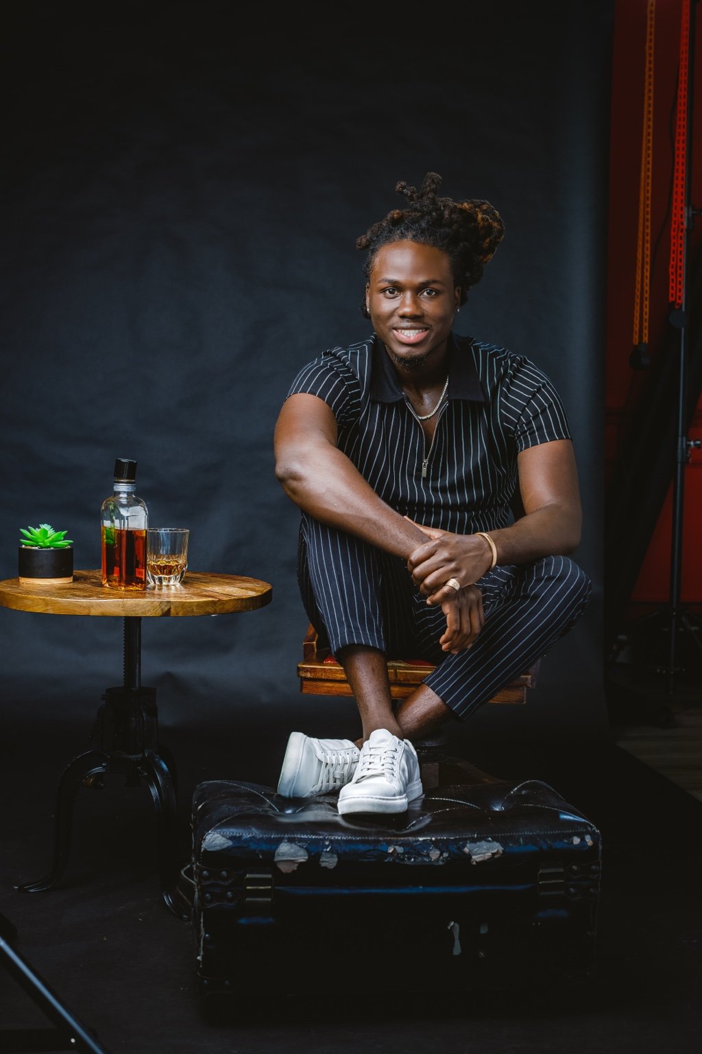 Antwan Daceus working on web design project at minimalist desk