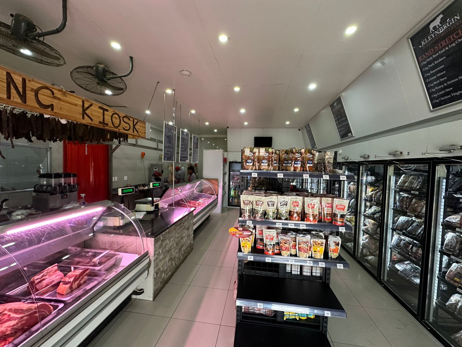Master butcher hand-crafting premium cuts of meat in traditional butchery