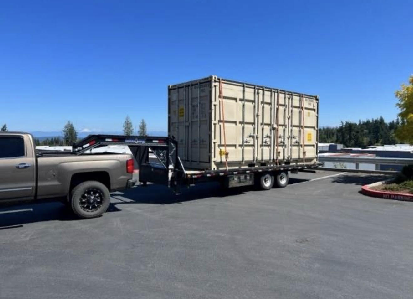 Truck hauling shipping container