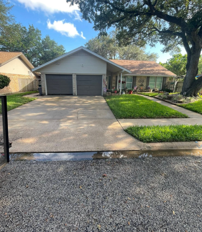 Smiling Victoria Texas homeowner who used Triple Crown Exterior Services