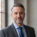 Headshot of a relieved man in his 40s