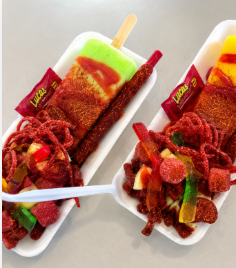 Colorful assortment of artisanal Mexican paletas in a freezer display