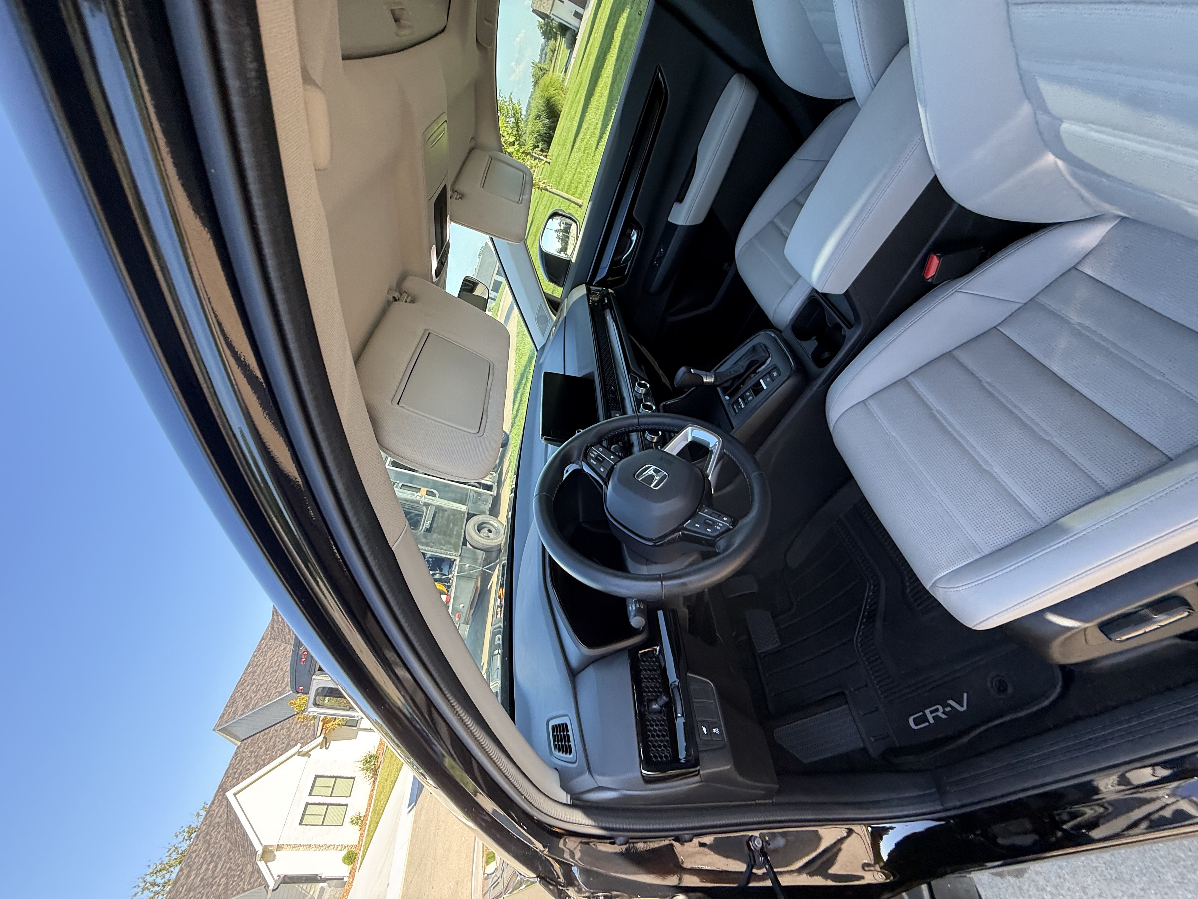 Immaculate luxury car interior with freshly conditioned leather seats, steam cleaned carpets and detailed dashboard by Bus Bros Mobile Detailing