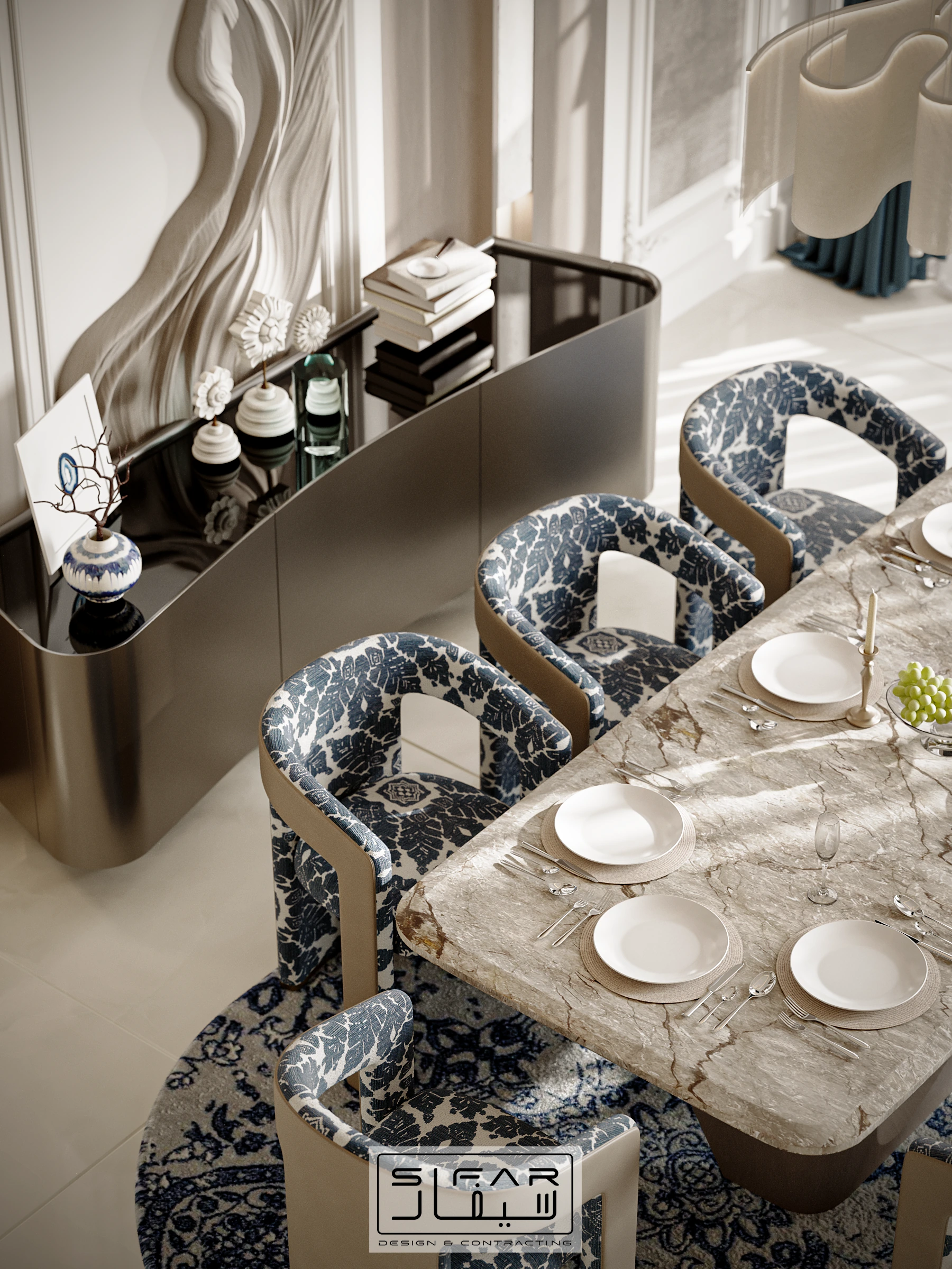 Dining area detail with marble table, patterned blue chairs, curved console, and sculptural wall artwork