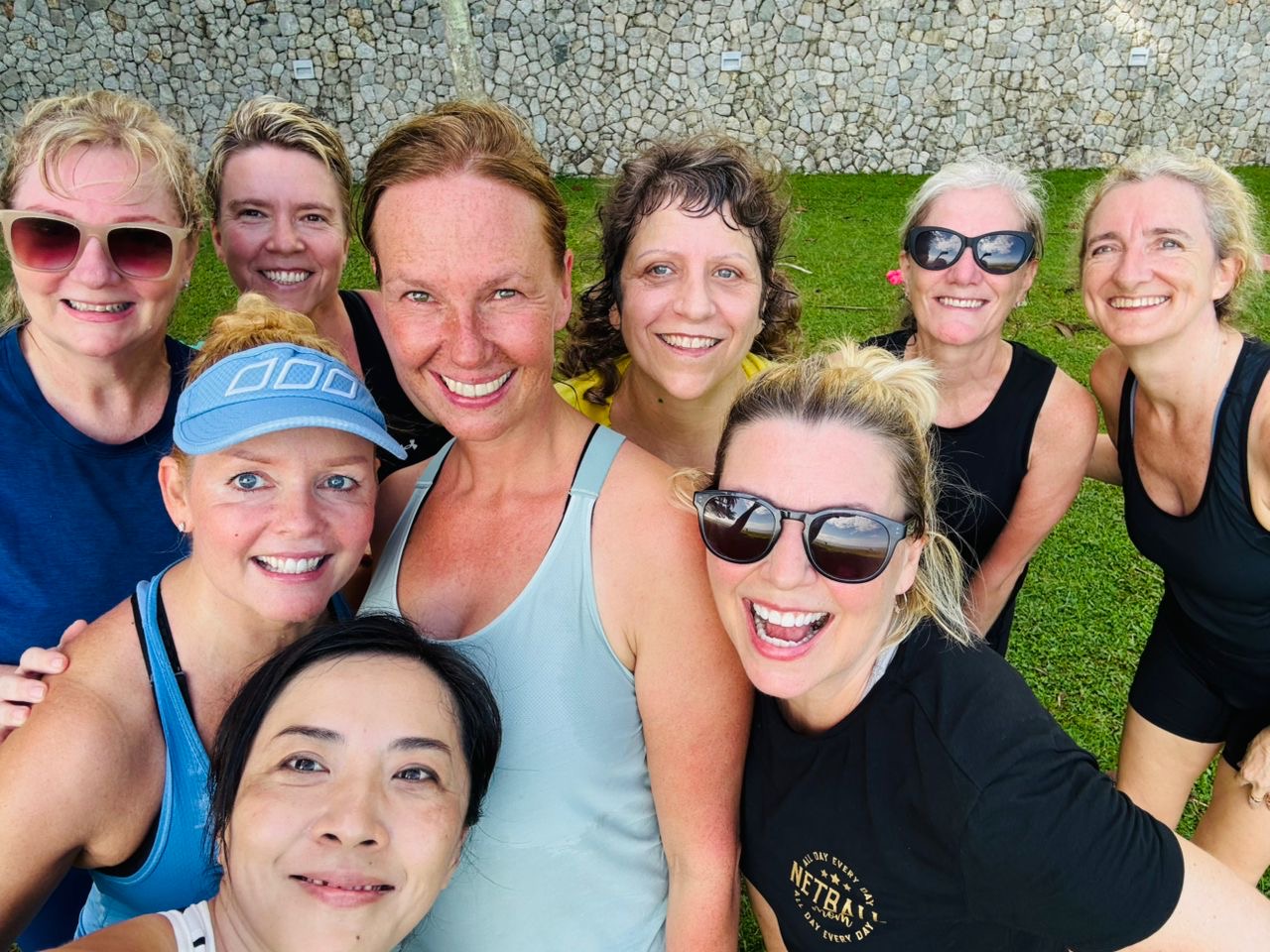 Women's outdoor HIIT group workout session in Penang park