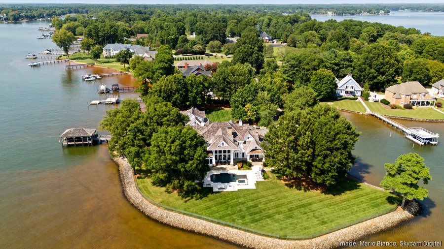 Aerial view of a luxury waterfront home in Clear Lake, TX