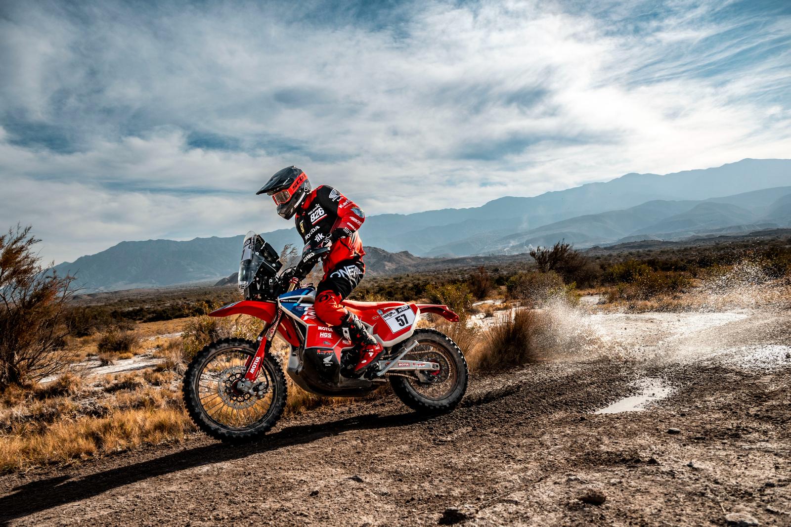 OWH Racing rally team in action - professional rally car competing on challenging terrain, capturing the raw power and precision of premium motorsport