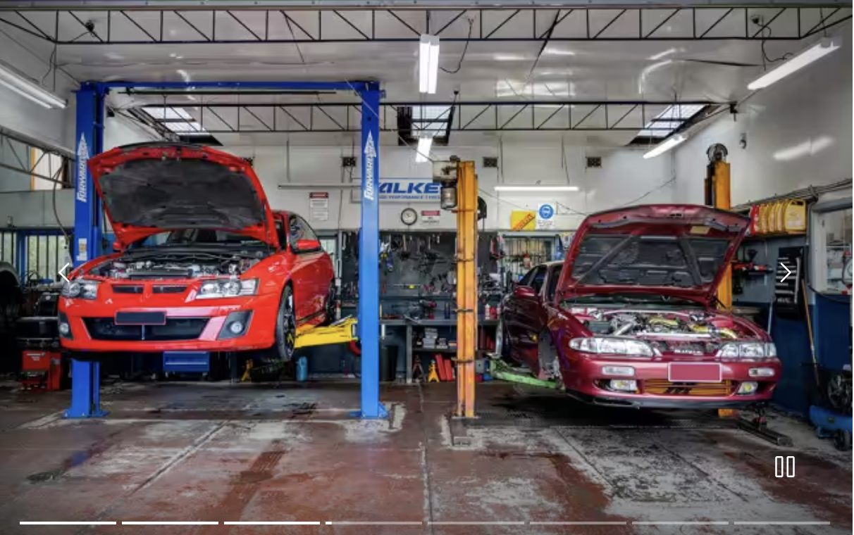 Master mechanic inspecting a high-performance engine in Maidstone Car Care workshop