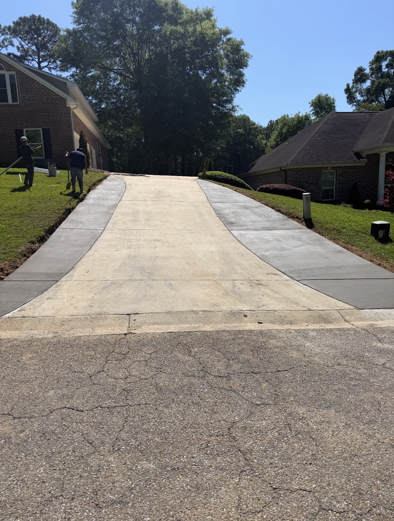 Professional Anchor Concrete team pouring and finishing a flawless concrete surface on a modern construction site