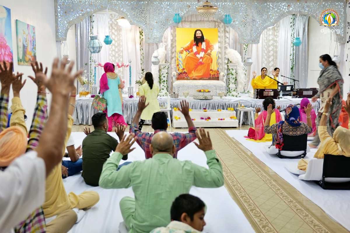 Serene devotee meditating at sunrise with folded hands in peaceful temple setting