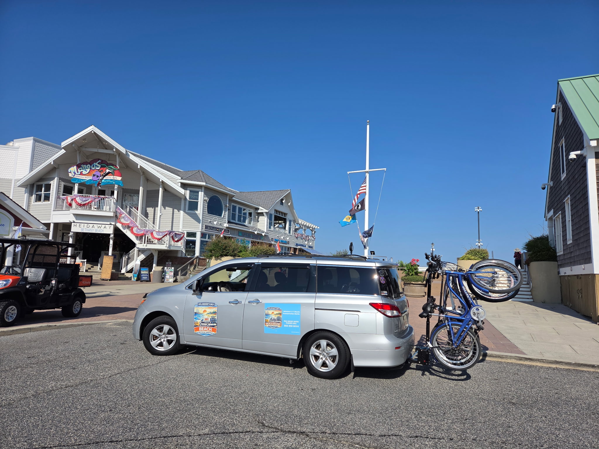 Shuttle van loaded with bicycles ready for beach transport