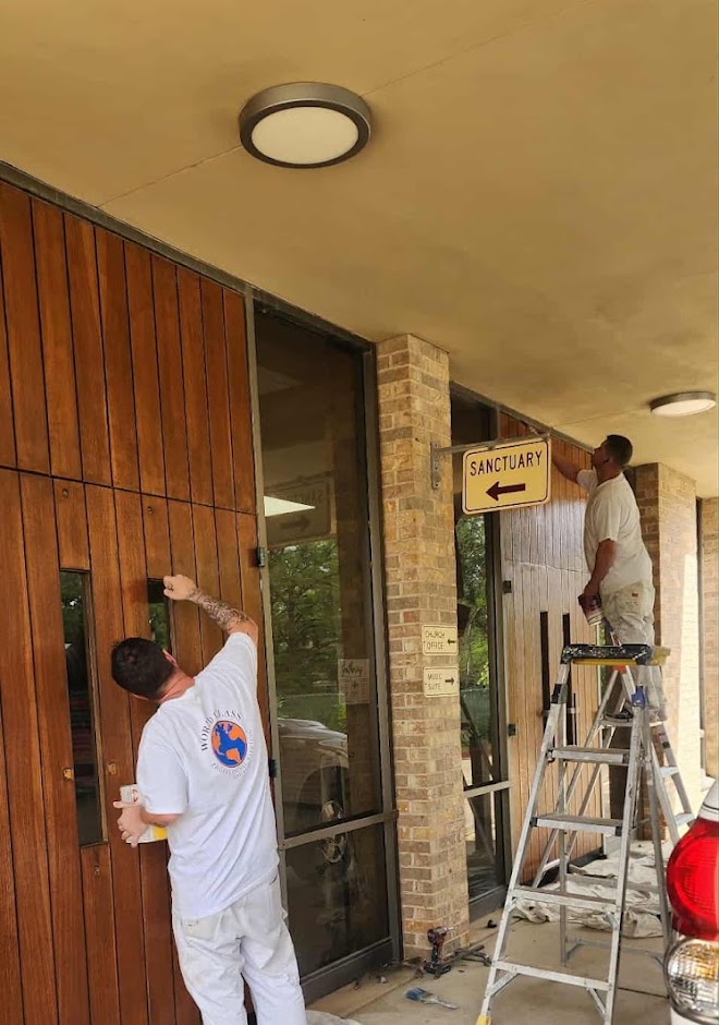 Beautifully repainted residential home exterior with fresh crisp paint and clean lines