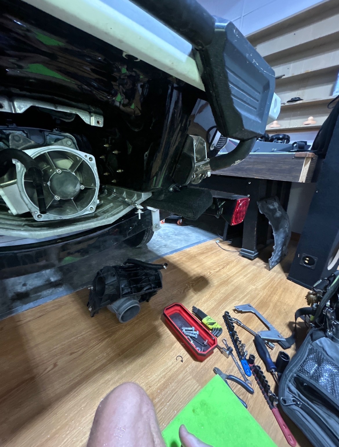 A personal watercraft undergoing thorough winterization service to protect it from cold weather.
