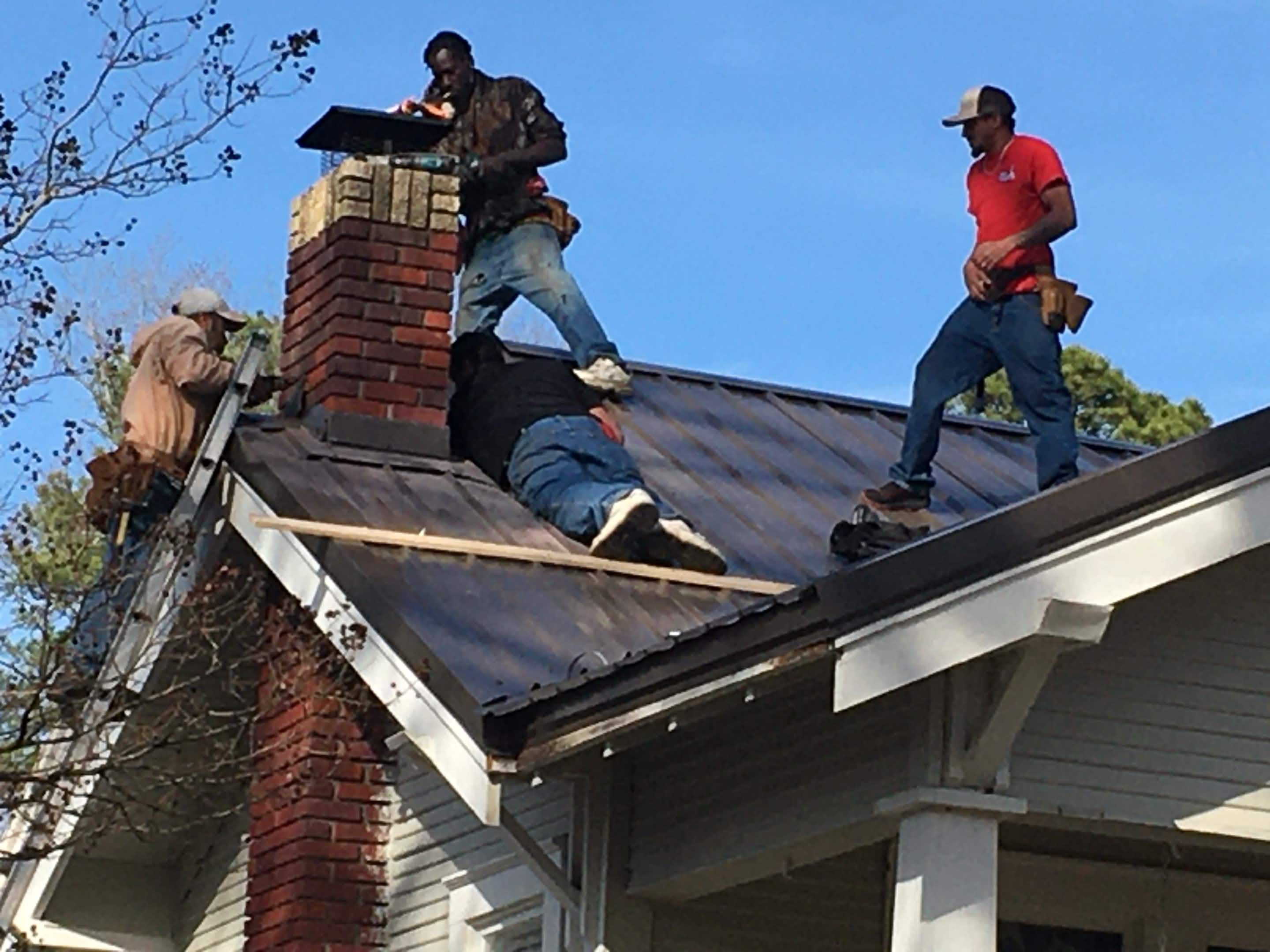 Brown Home Improvement carpentry crew building custom wood deck and framing in North Louisiana
