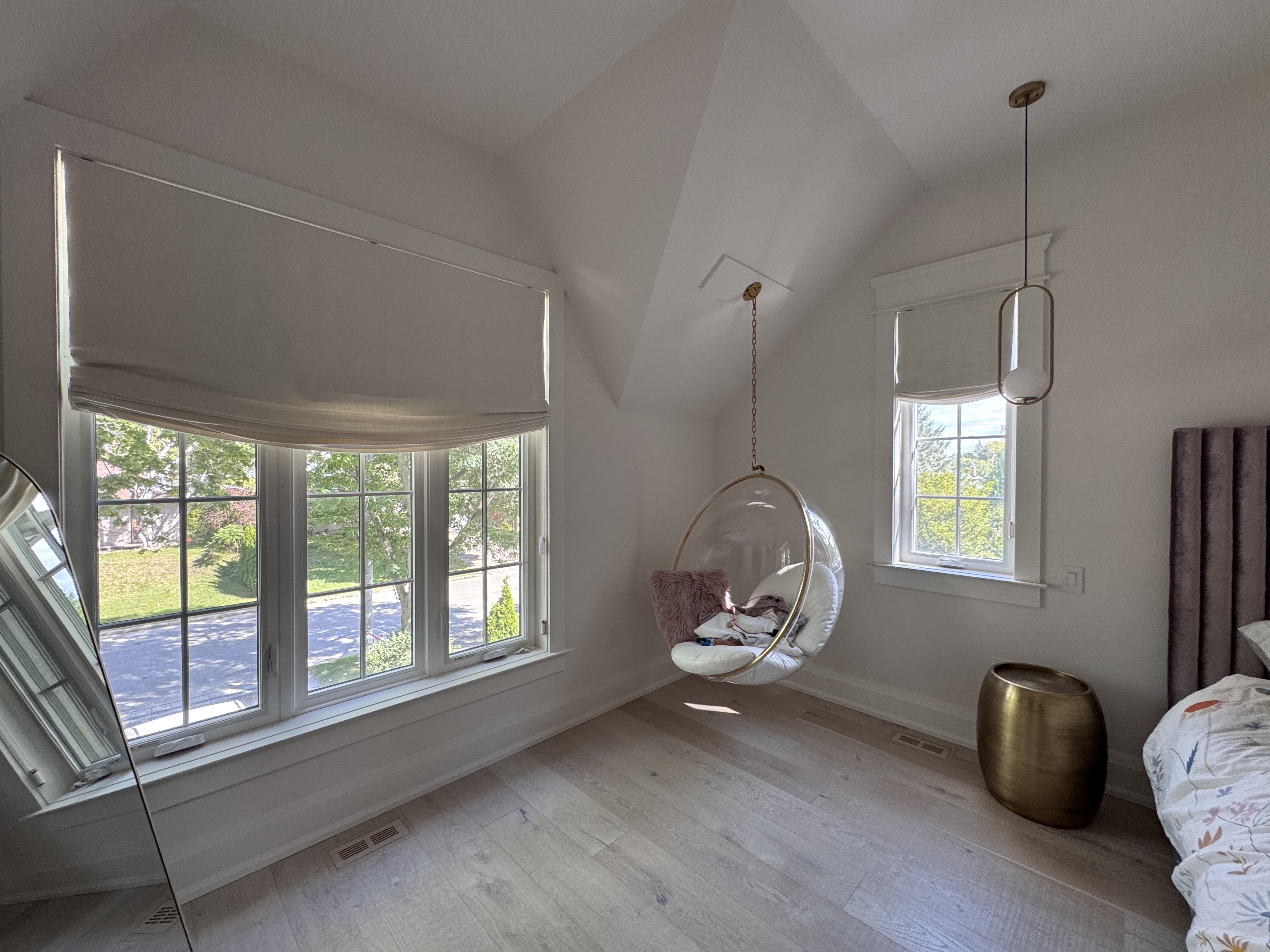 Elegant master bedroom in Stouffville with premium custom roman shades