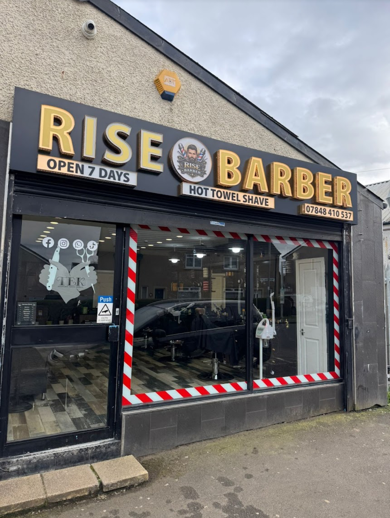 Sharp textured crop haircut with tight skin fade finished at Rise Barber Studio on a stylish young client
