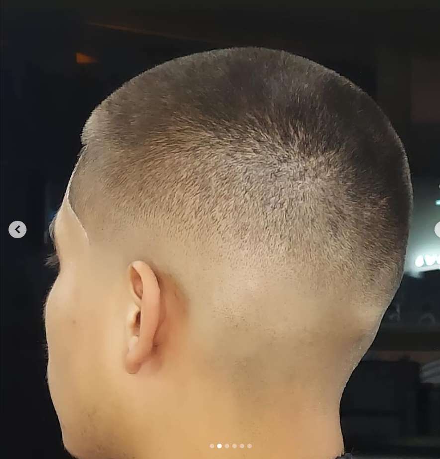 Close up of a highly precise sharp skin fade haircut at Mel's Barbershop