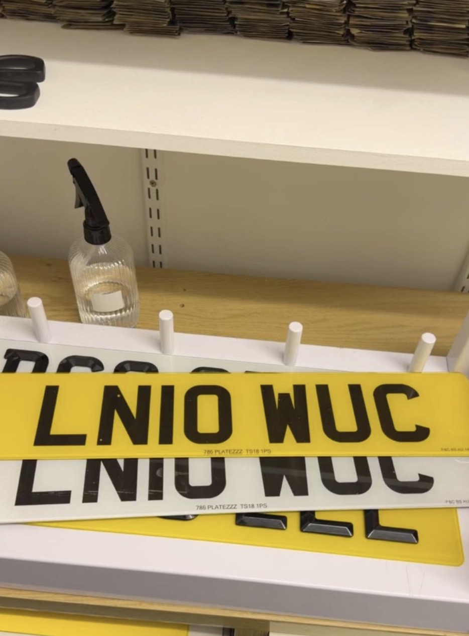 Standard road legal DVLA compliant UK number plate with reflective yellow rear and white front finish