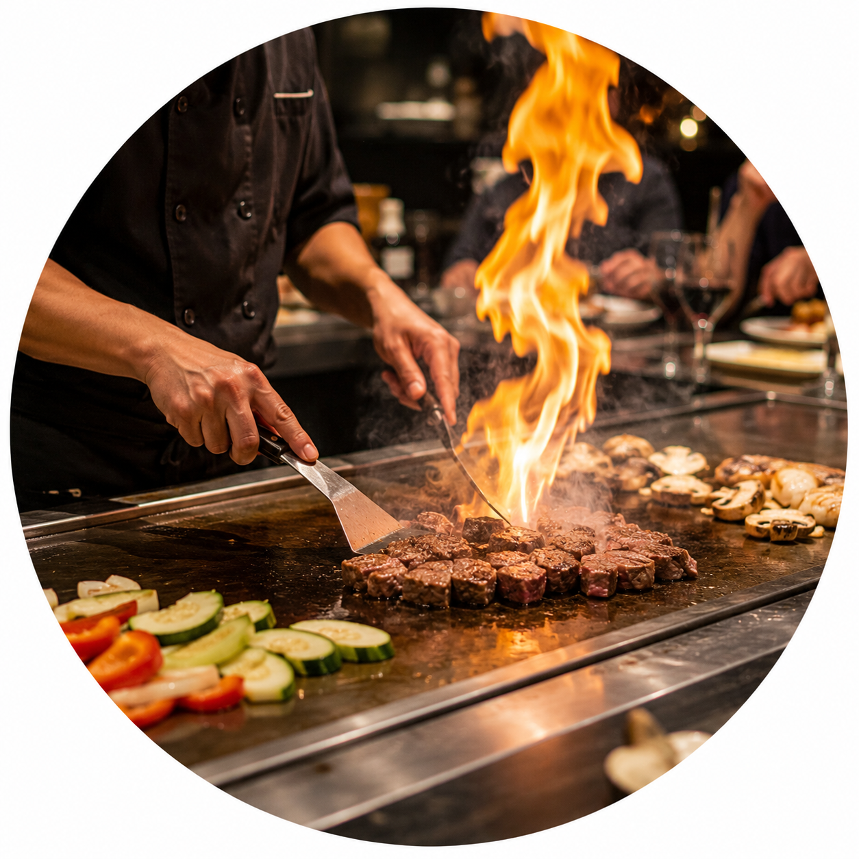 Chef cooking on flaming teppanyaki grill with sizzling meats