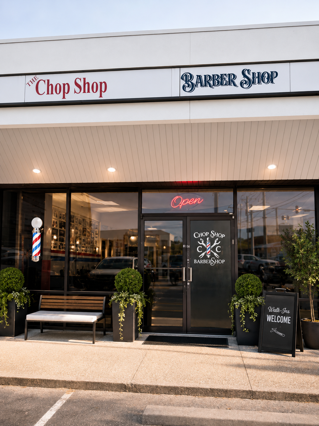 Professional barber giving a fresh fade haircut in a modern barbershop