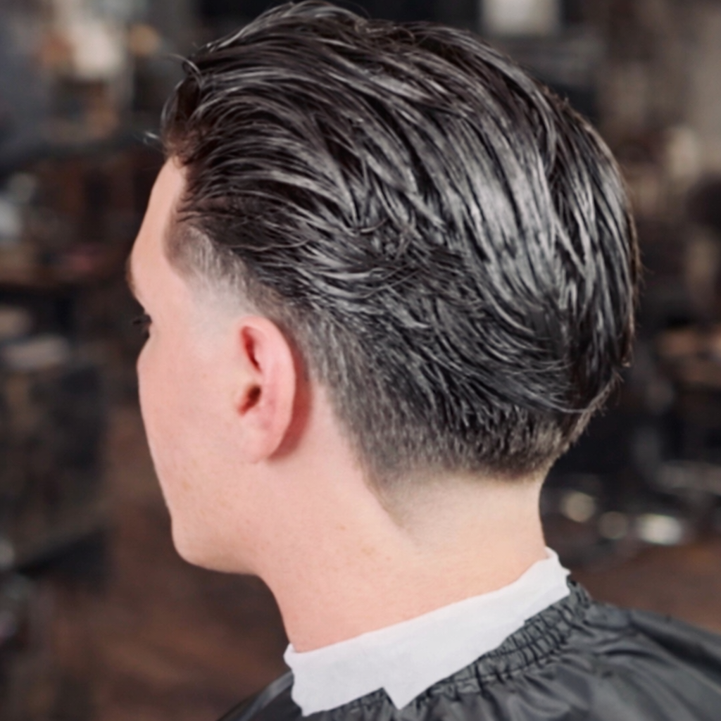 A sharp fade haircut