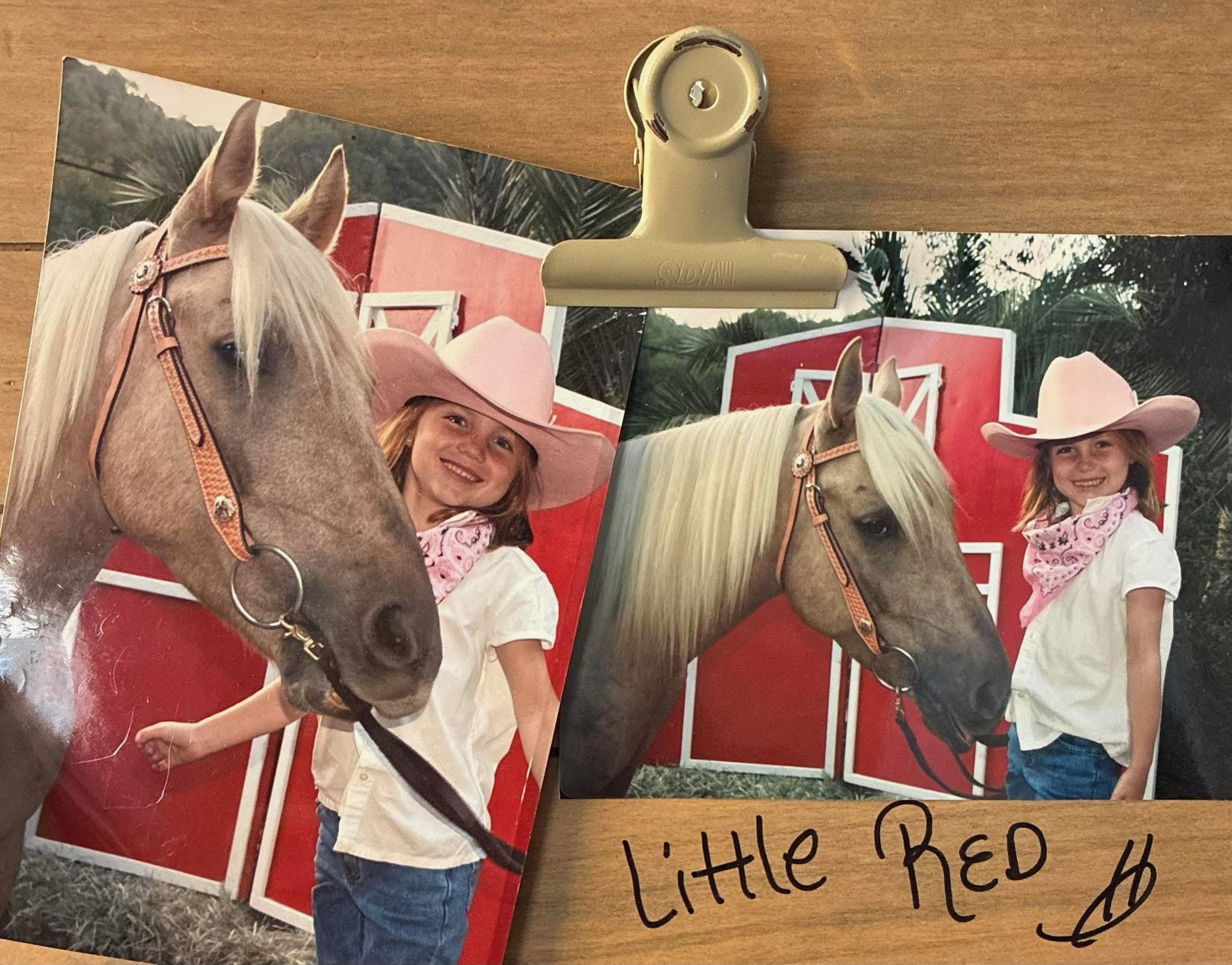 The family behind Little Red's Barnyard Friends smiling with a gentle goat
