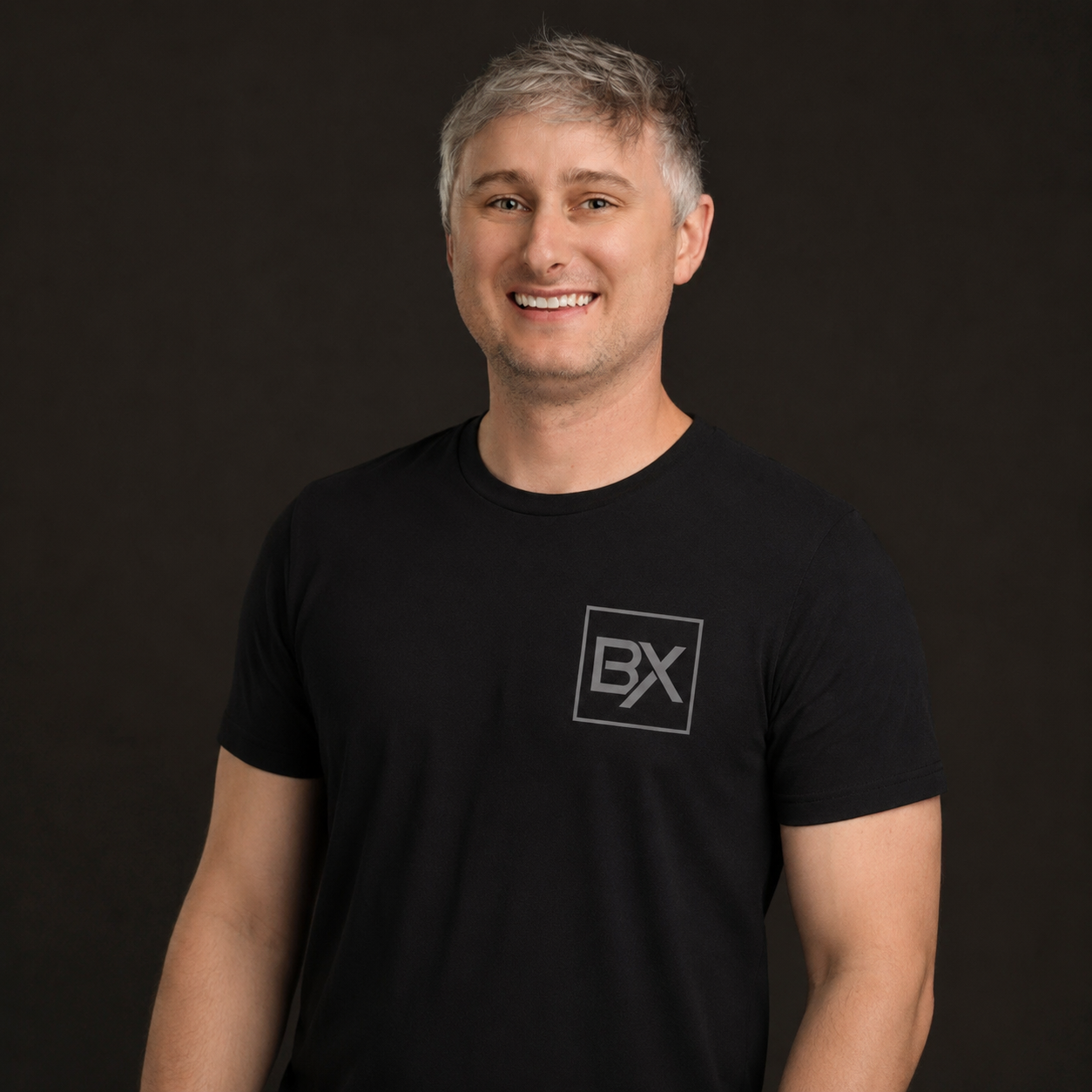 Portrait of a satisfied business owner who used Rescue Digital's services