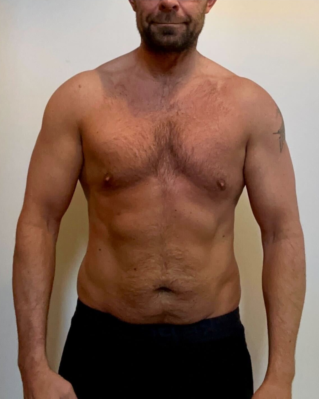 After transformation photo of male competitor Jason K showing chiseled vascular muscular competition ready physique after FIZEEK FREEK challenge