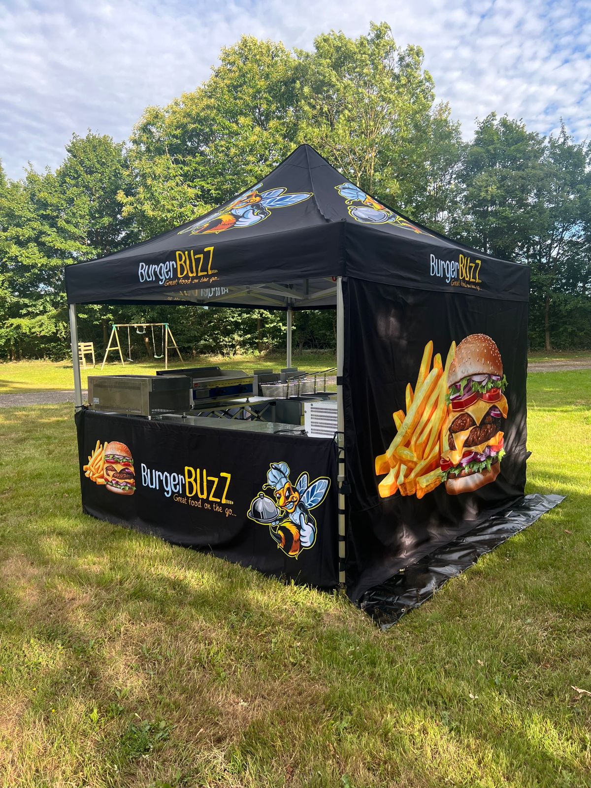 A signature BurgerBuzz burger being prepared