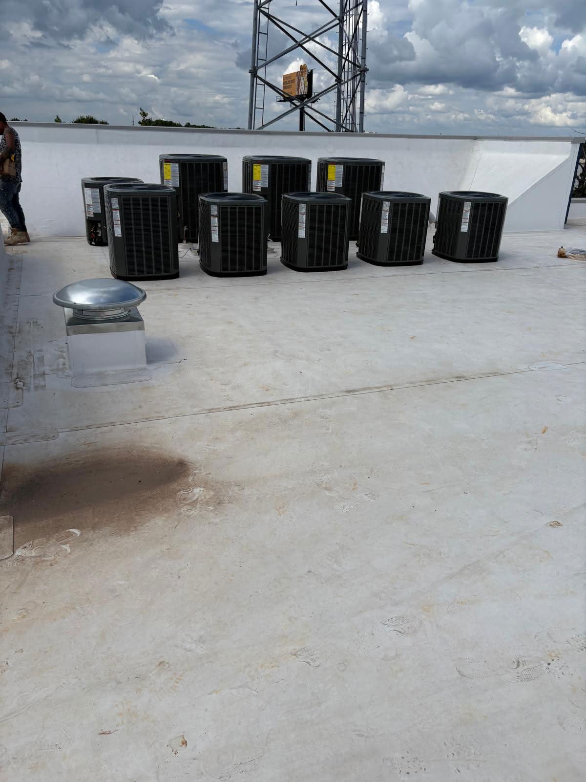 Multiple commercial rooftop HVAC condenser units installed by GD&B3 One Source Mechanical Solutions