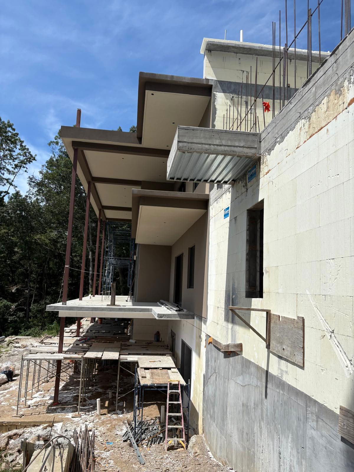Master GD&B3 One Source Mechanical Solutions technician in tailored uniform performing precision HVAC installation inside a luxury modern residence