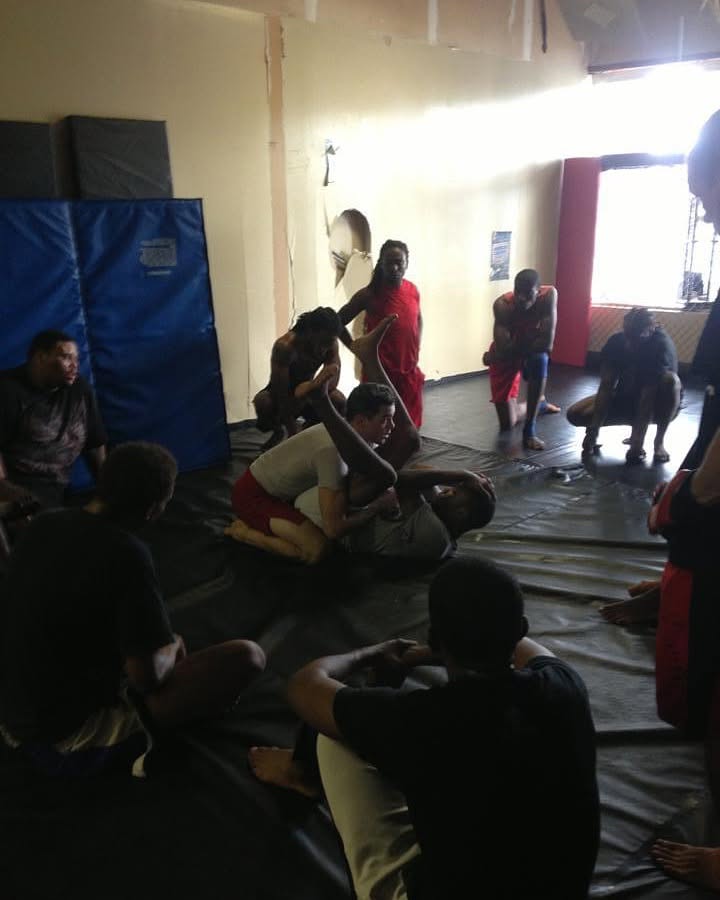 Brazilian Jiu Jitsu practitioners grappling on the mat