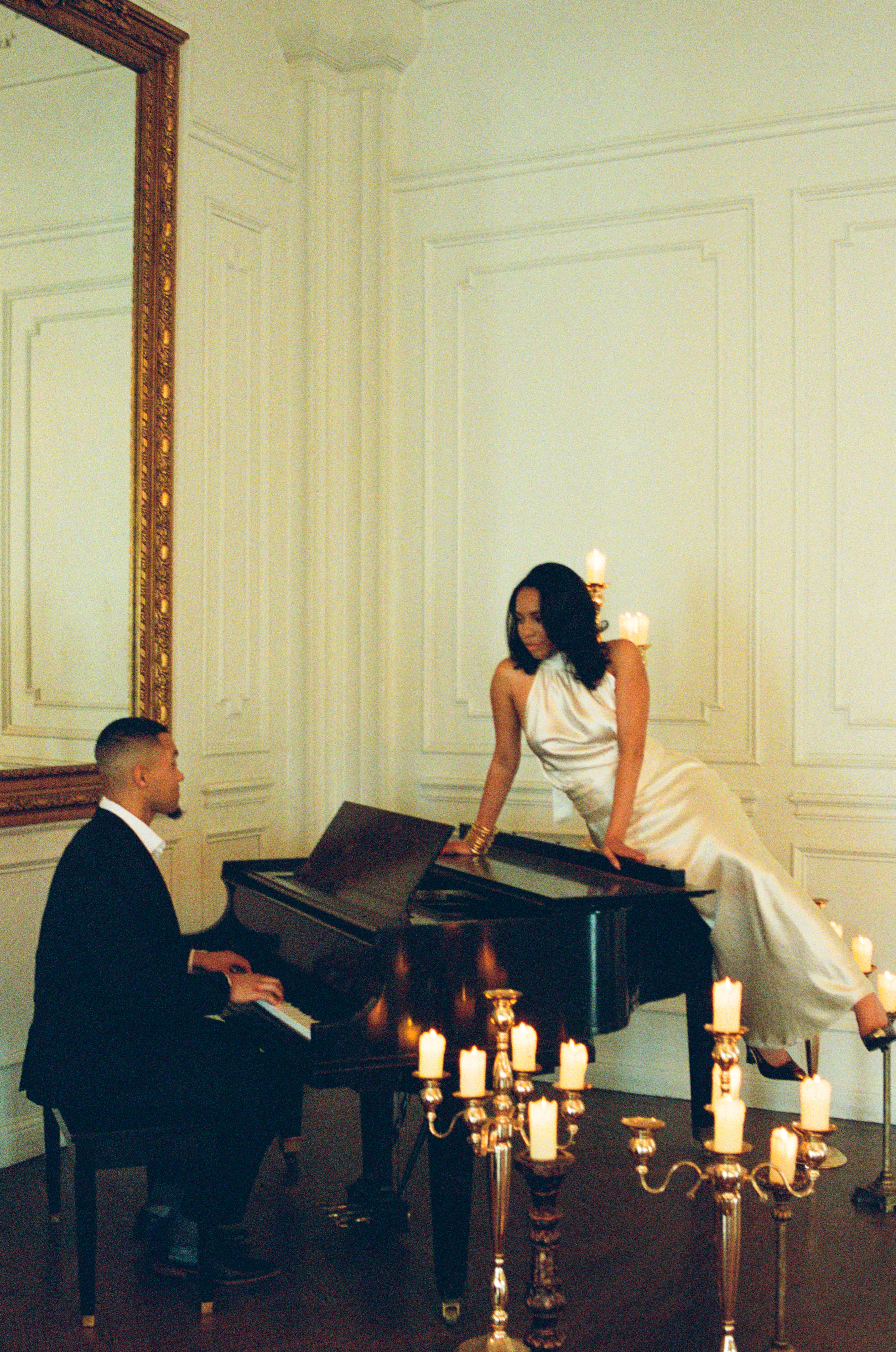 Moody and romantic engagement portrait of Kahlil and Kayla Folly in formal wear