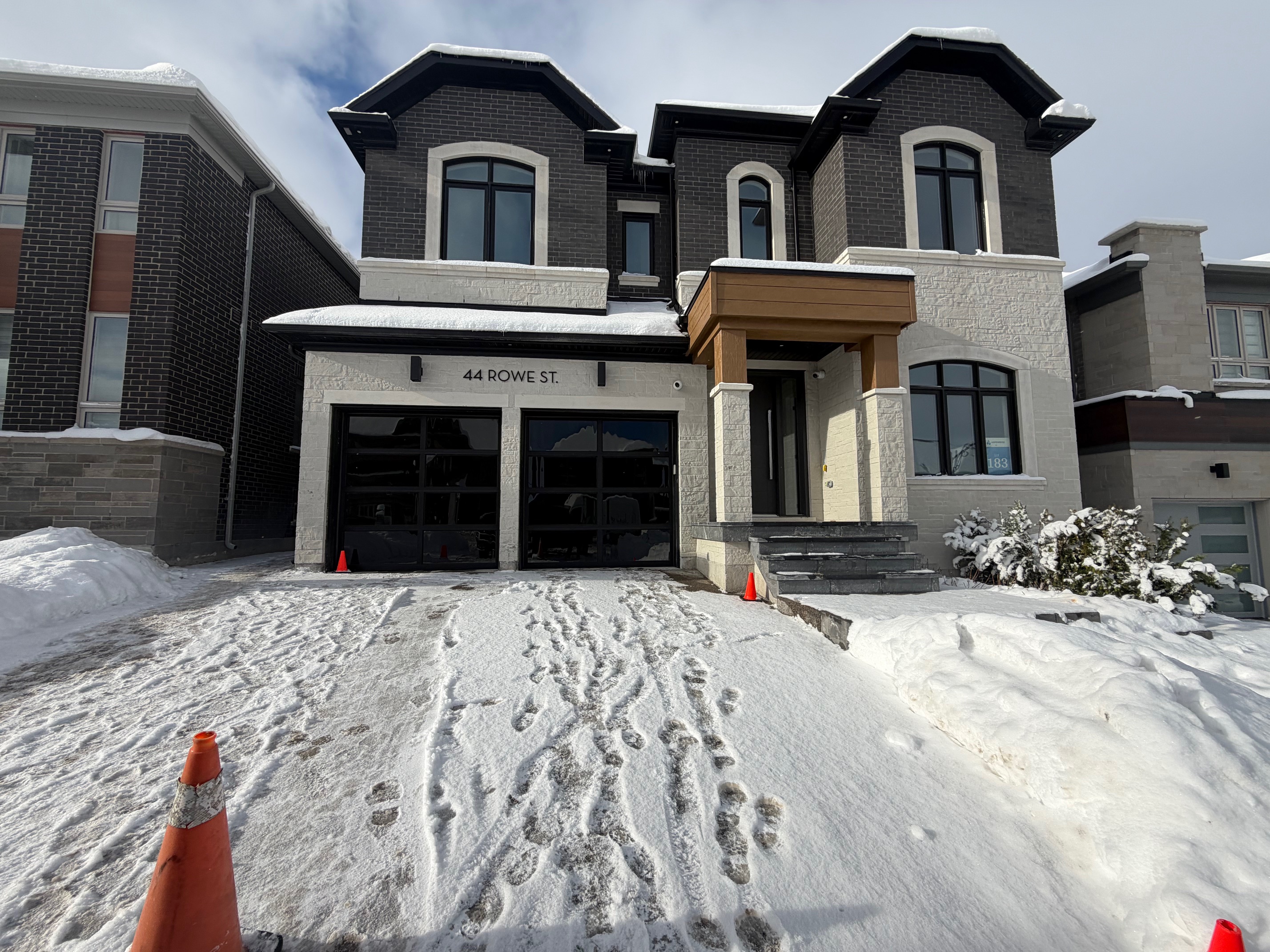 Elegant wood finish garage door for a home